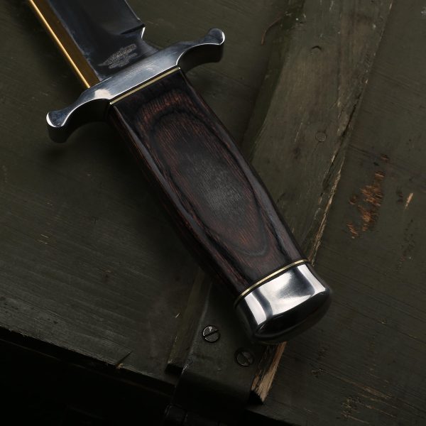 AF019 knife handle texture close-up with solid wood and steel pommel